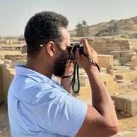 Mohamed Hamad taking photos in Giza, Egypt